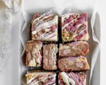 ruby chocolate blondies in a ceramic dish with white napkin