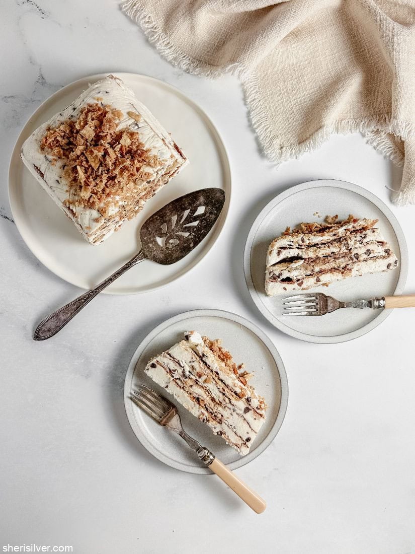 cannoli icebox cake slices on white plates with bakelite forks