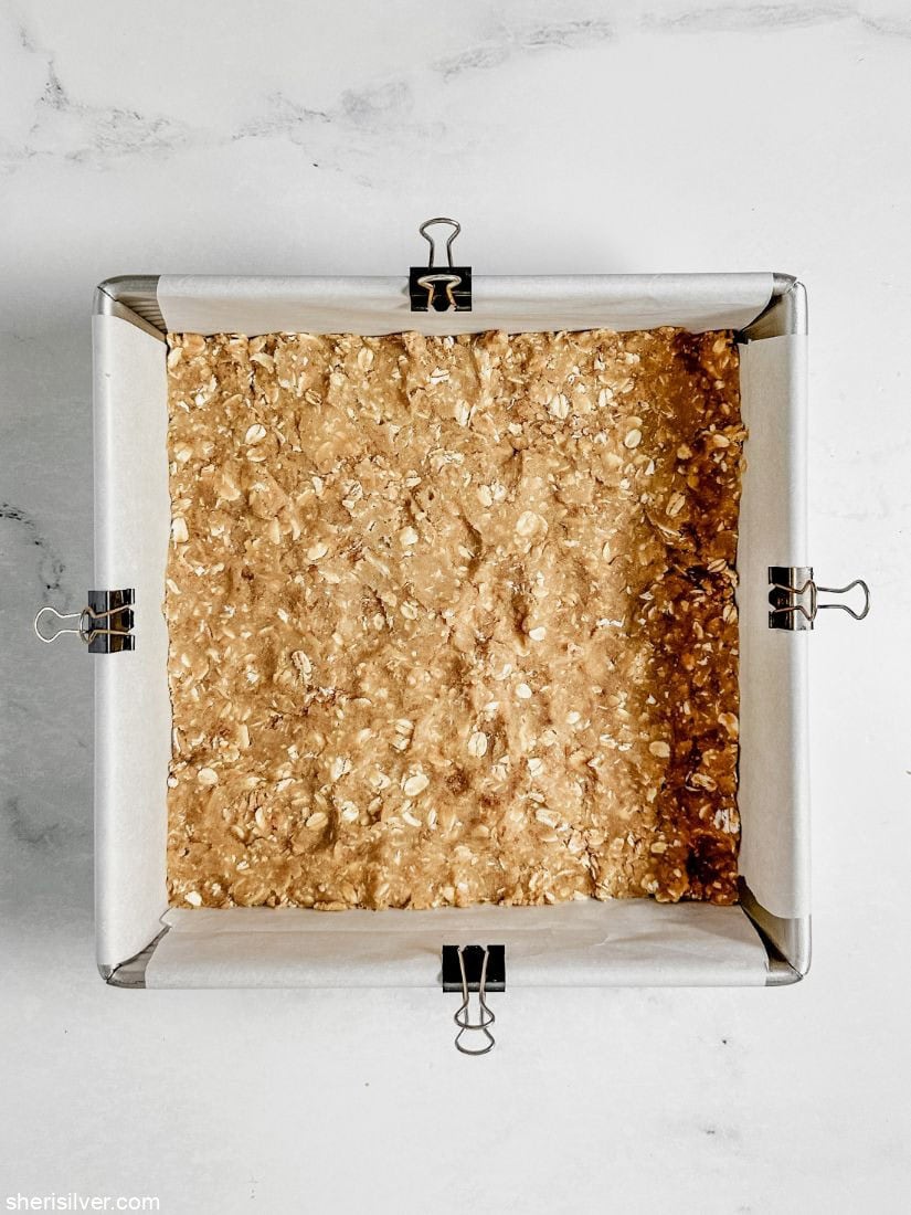 Oat layer for raspberry oat squares in a square baking pan