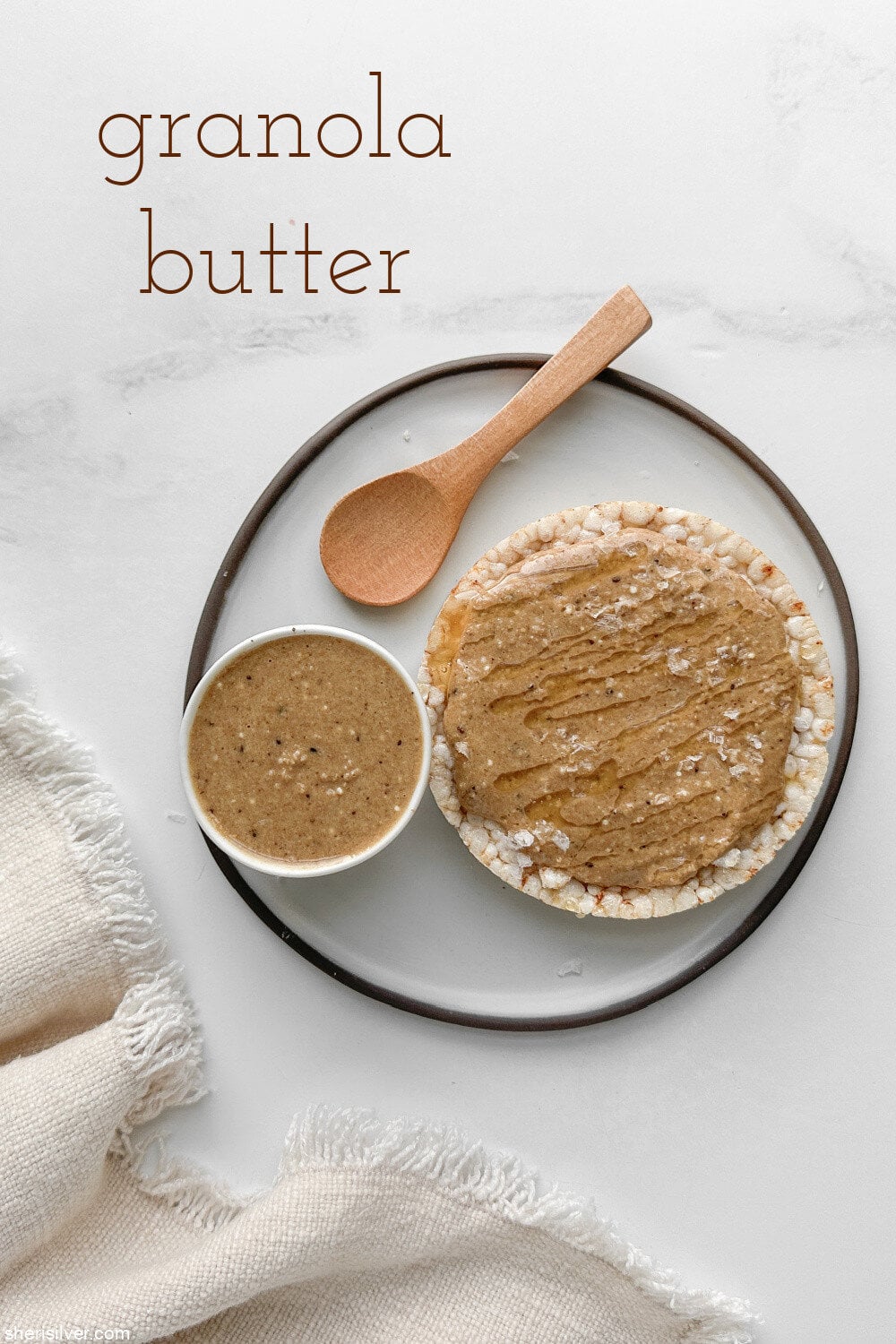 granola butter on a rice cake