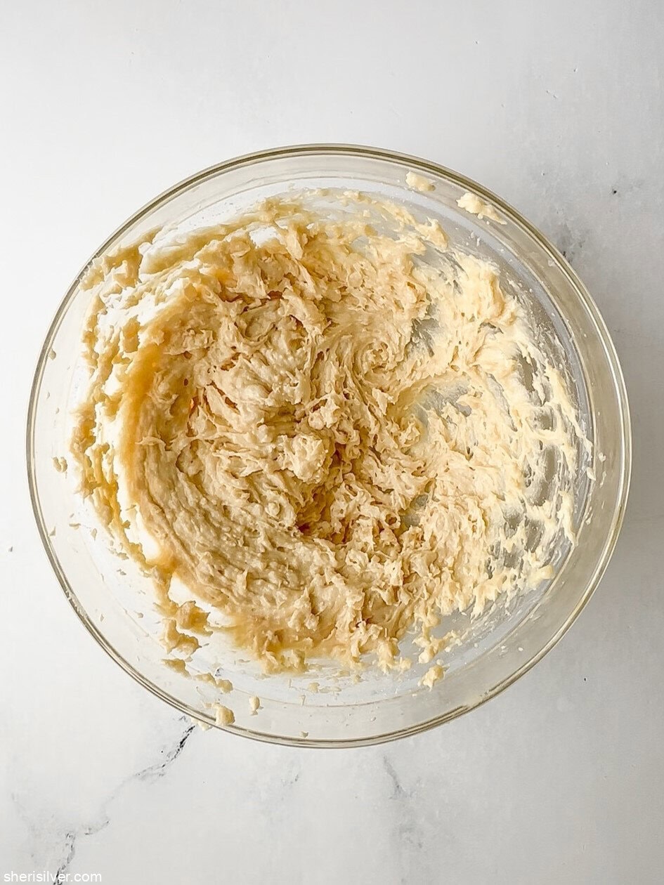 batter for apricot almond bars in a glass bowl