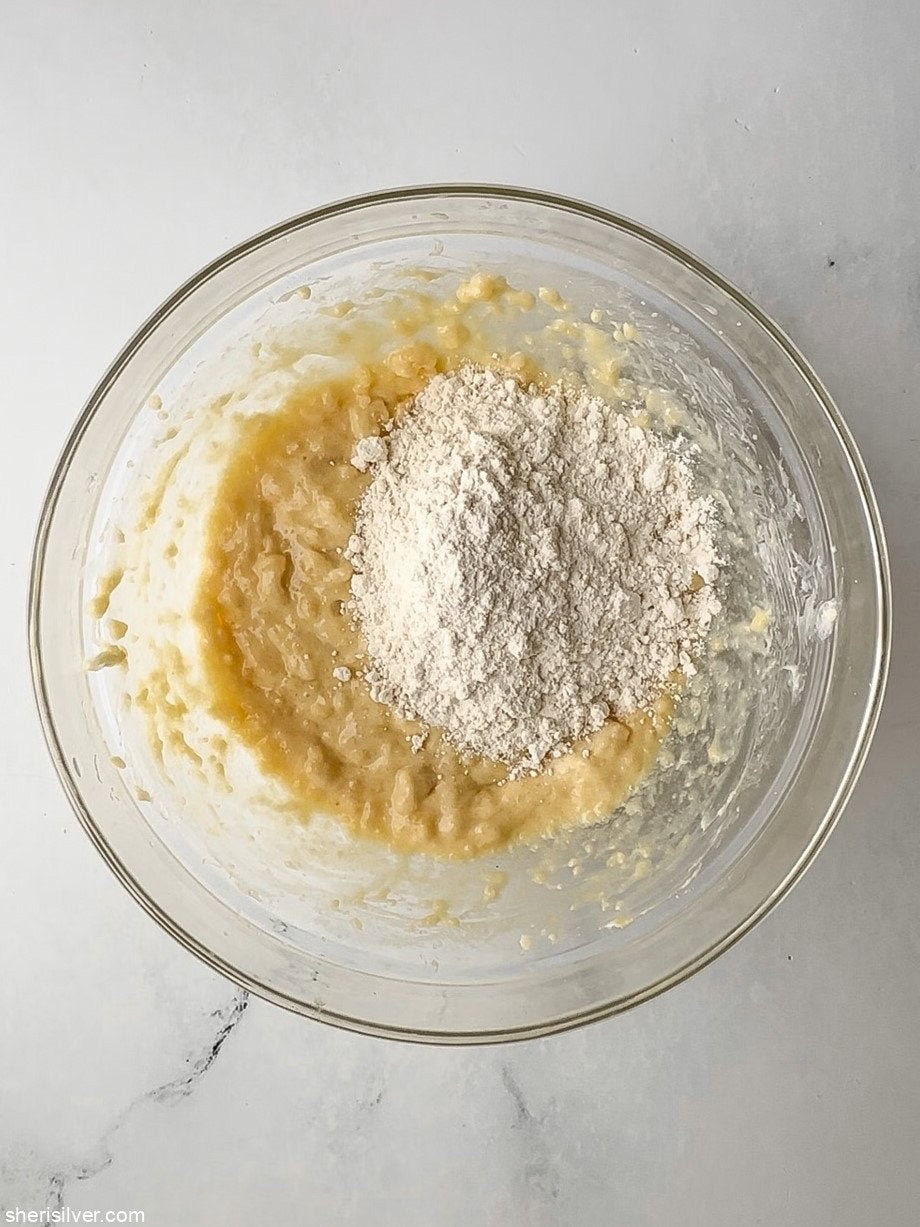 batter for apricot almond bars in a glass bowl