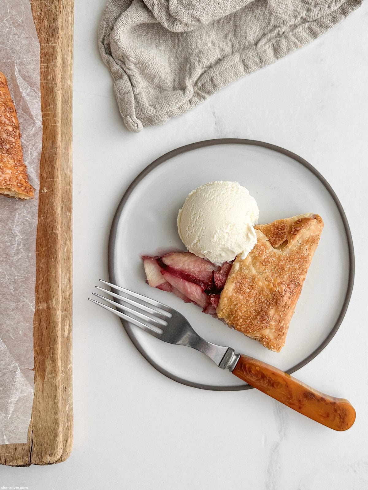 easy peach galette on a ceramic plate