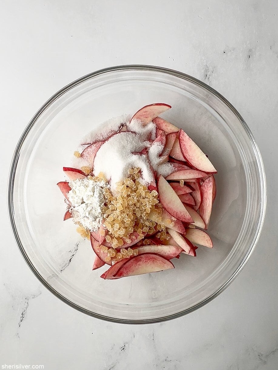 filling for easy peach galette in a glass bowl