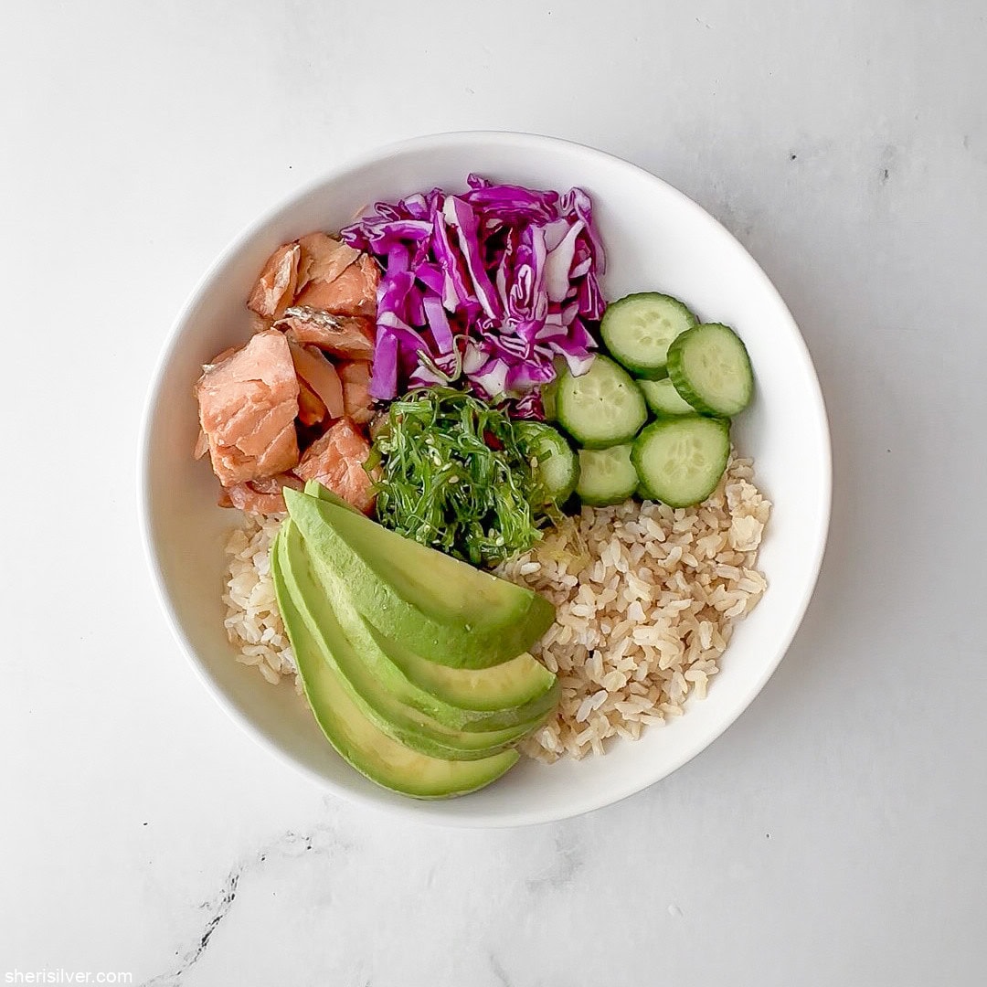 smoked salmon rice bowl in a white bowl