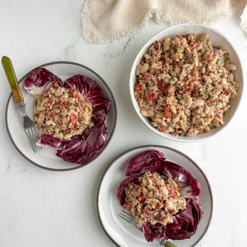 Mediterranean tuna and white bean salad on ceramic plates