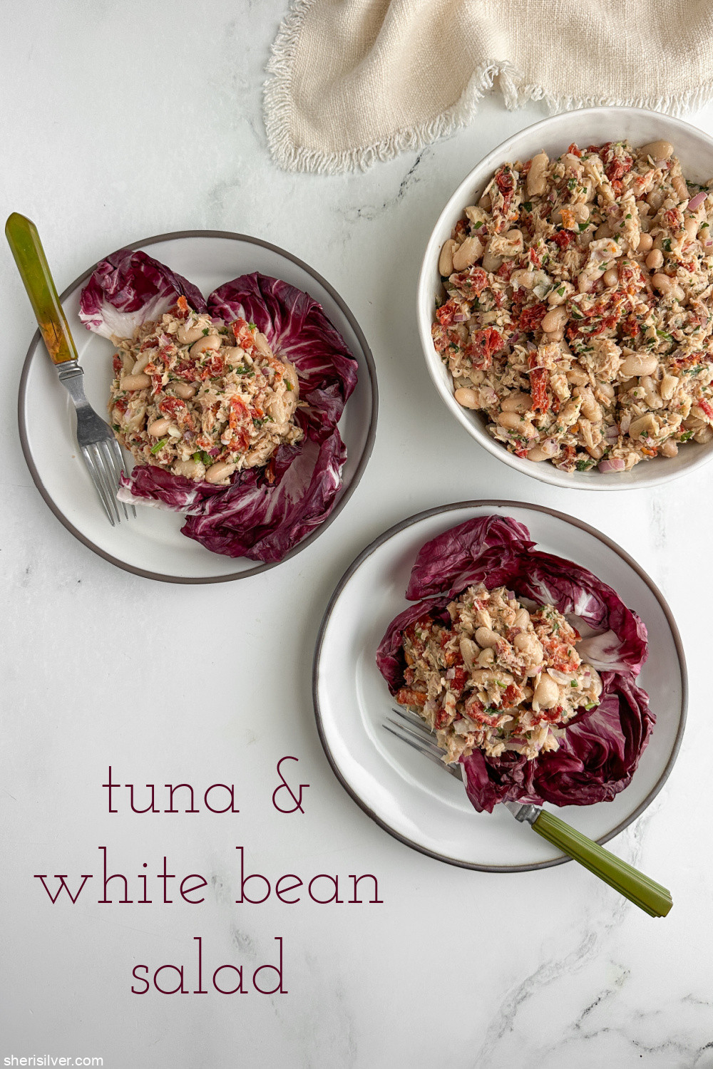 Mediterranean tuna and white bean salad on ceramic plates