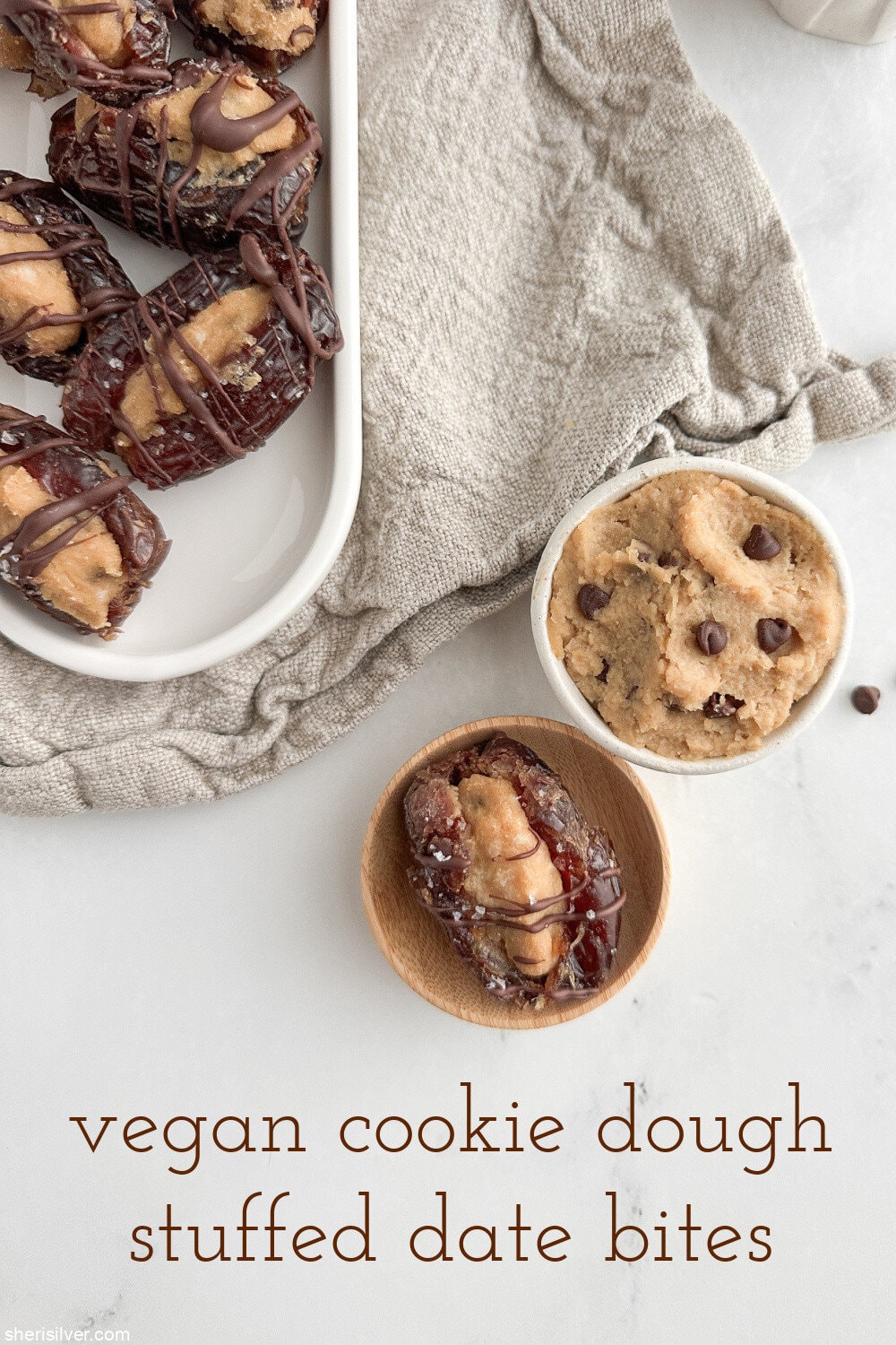 Close-up of one stuffed date next to a small dish of cookie dough with text title overlaid.